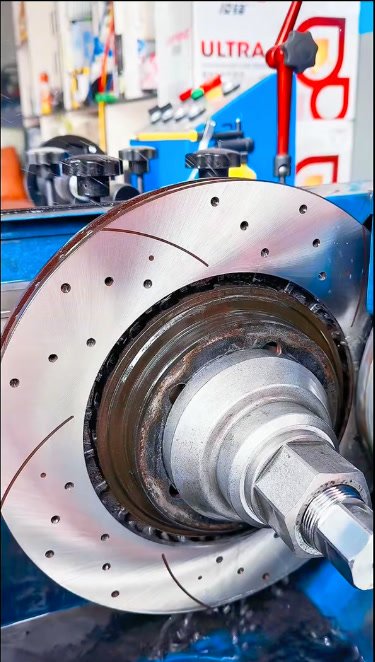 A drilled and slotted performance rotor on the lathe